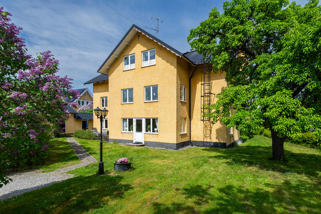 Huset med den vackra trädgården