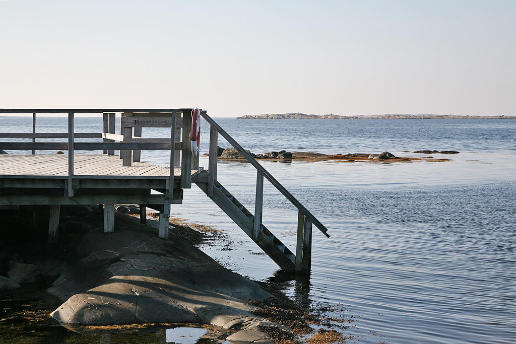 Salta bad från stränder, klippor och badstege