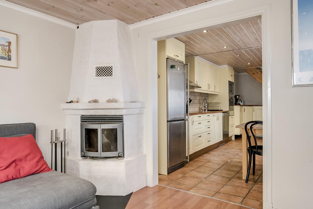 Öppen spis i vardagsrum hus nr 1
