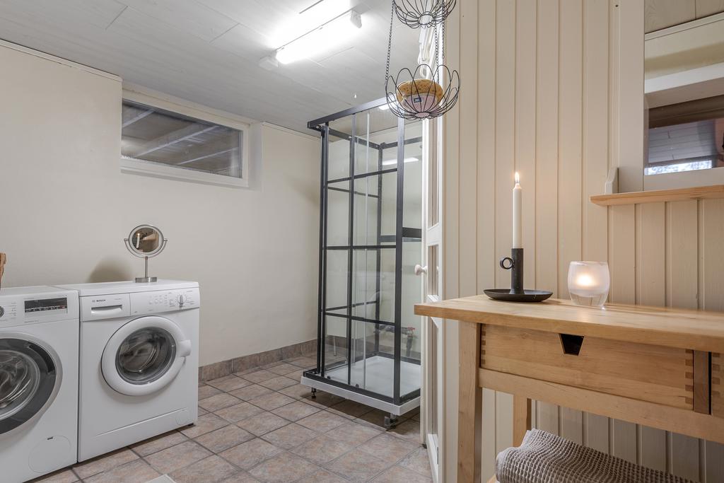 Tvättstuga med dusch och bastu