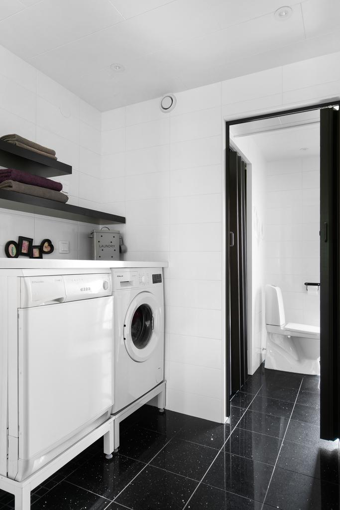 Tvättstuga intill duschrummet