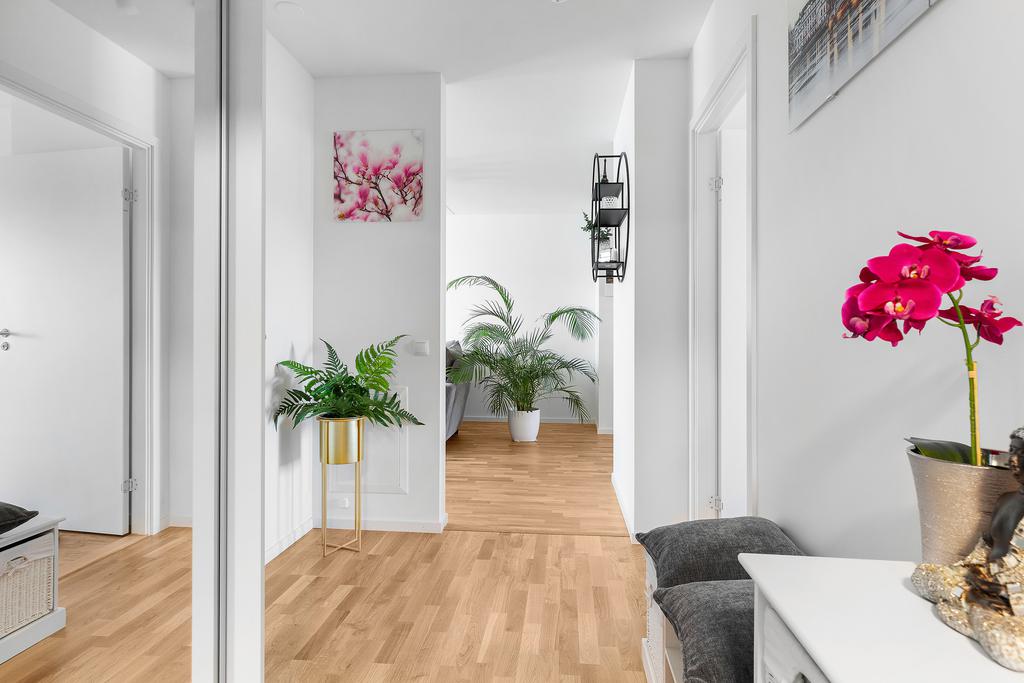 Den ljusa och välkomnande hallen