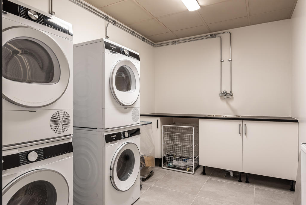 Gemensam tvättstuga. 