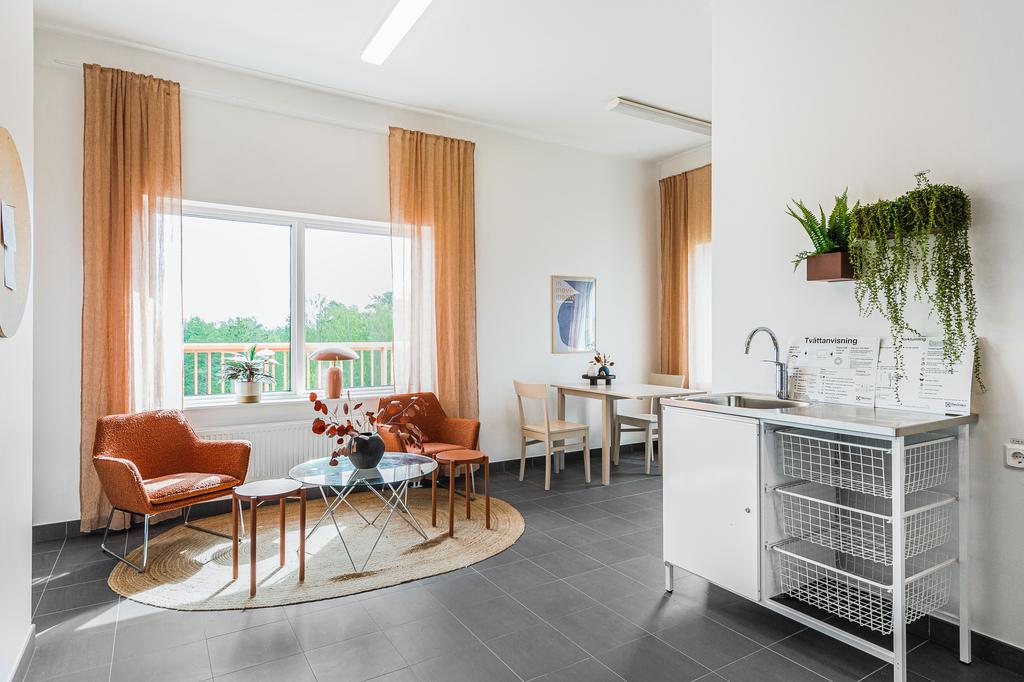 Loungedel i tvättstuga och sammanhängande till takterrass 