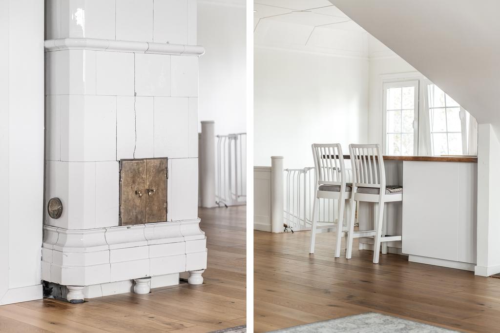 Härliga detaljer som fungerande kakelugn och barkök.