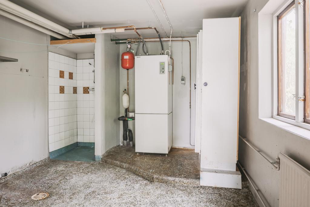 Tvättstuga med dusch och bergvärmepump