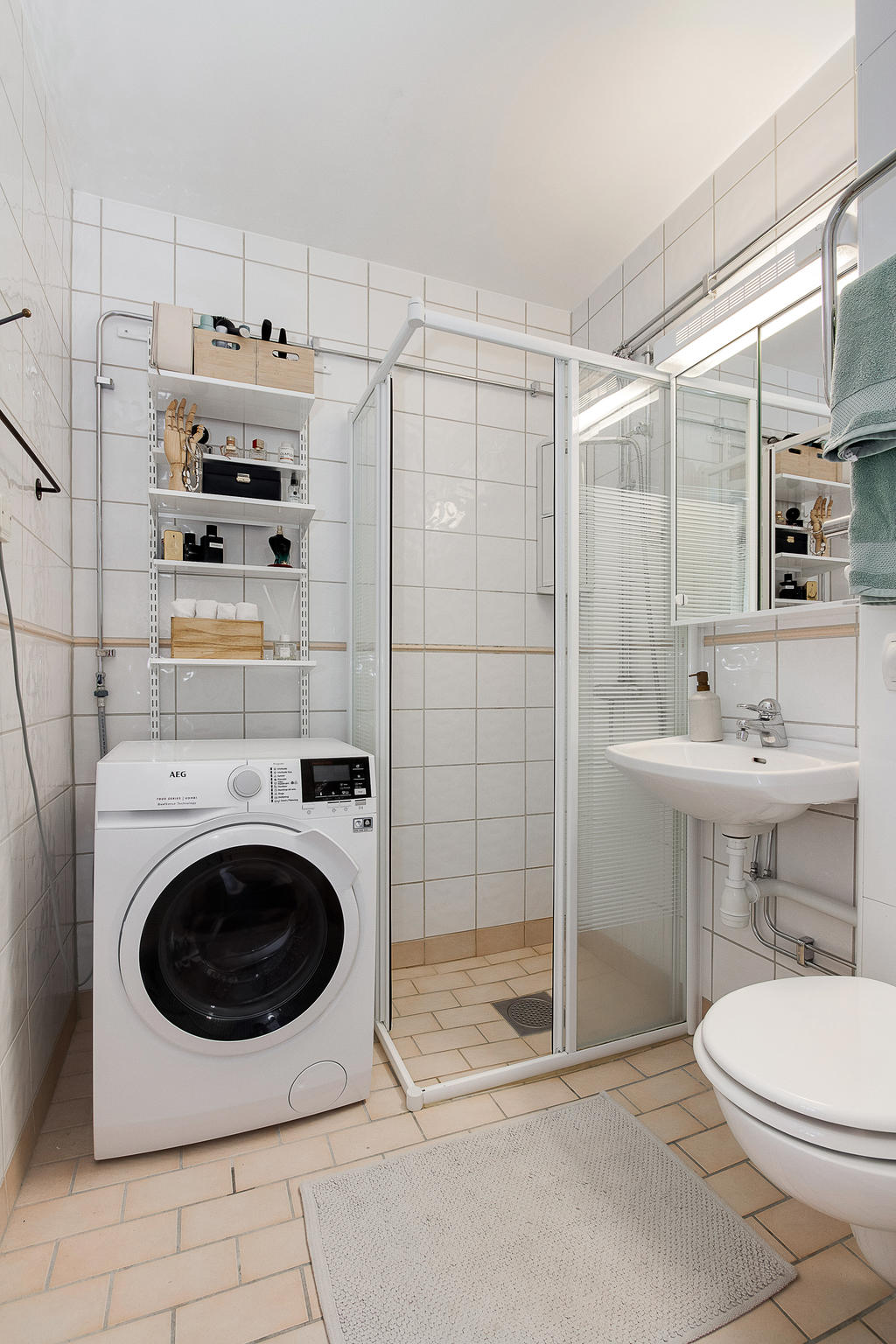 Badrum med egen tvättmaskin