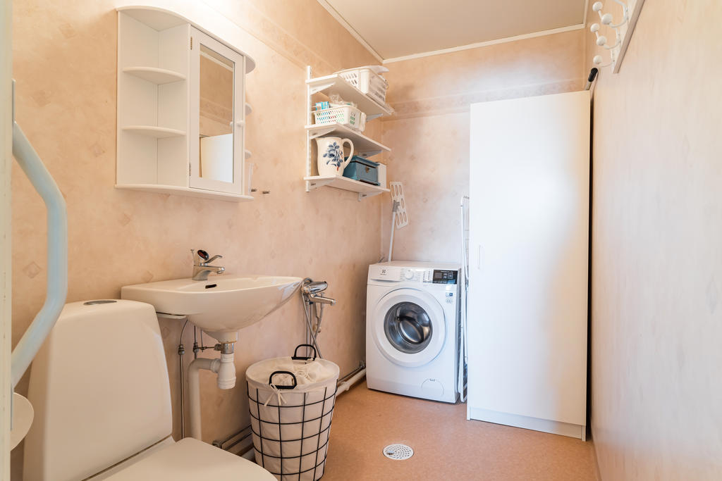 Badrum med egen tvättmaskin