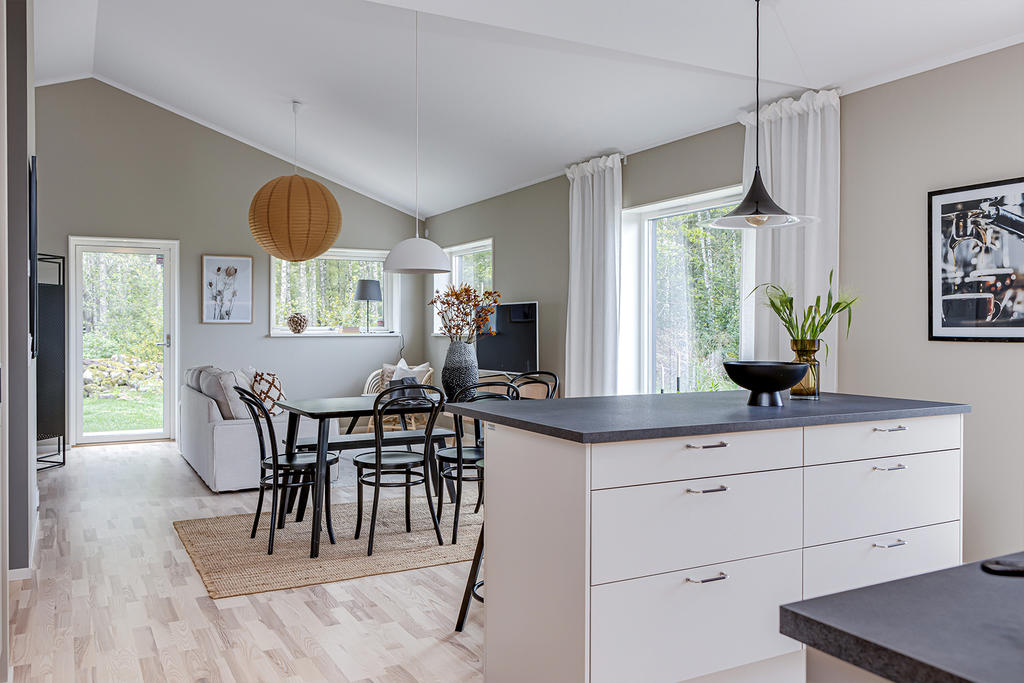 Fotomontage på förslag på tomterna. 