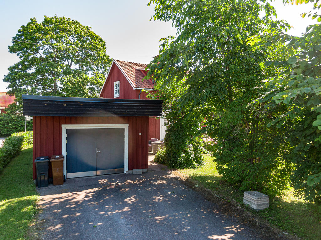 Integrerat garage för en bil