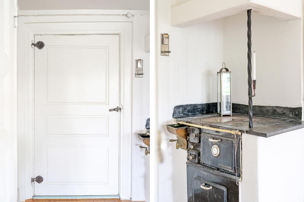 Dörr och järnspis i original i den ursprungliga delen av huset 