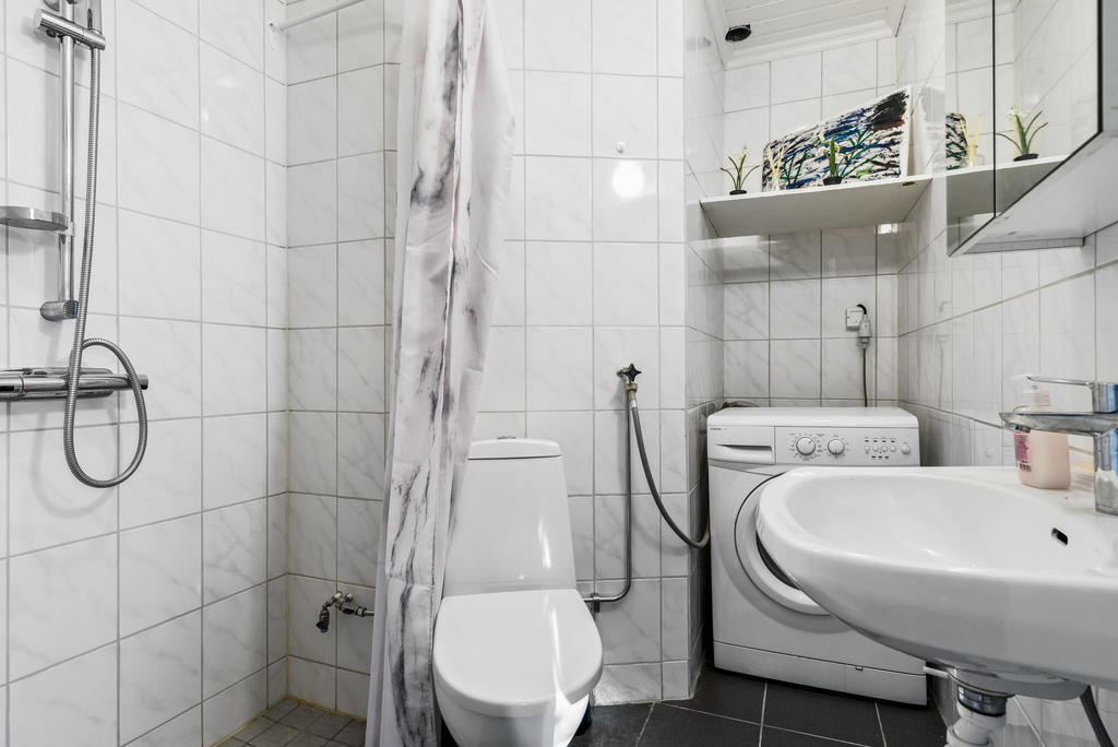 Duschrum med egen tvättmaskin