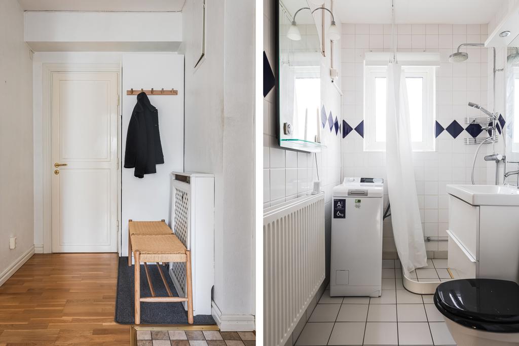 Hall med dörr till helkaklat WC & duschrum med egen tvättmaskin