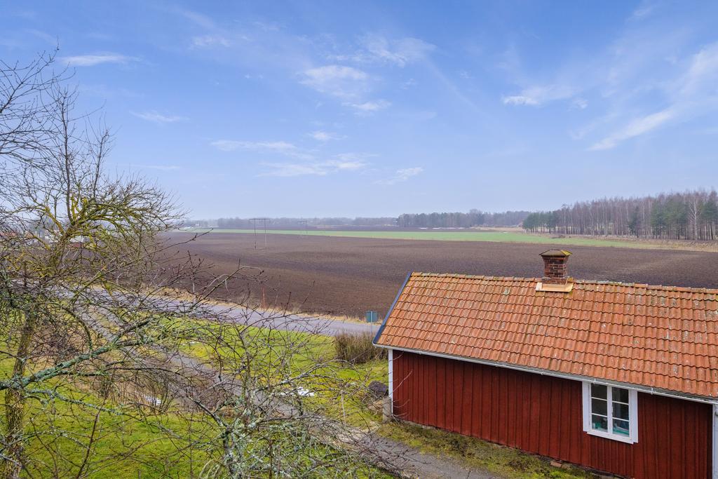 Vy över öppet landskap, södersida