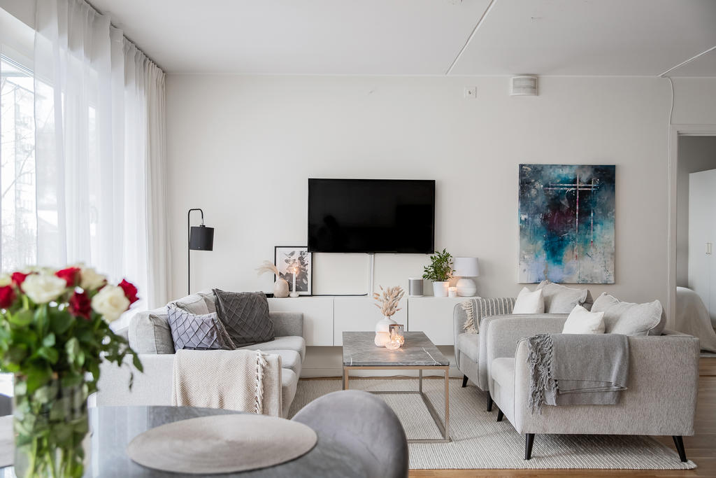 Möjlig möblering i vardagsrumsdelen/allrummet (bild från annan såld lägenhet)