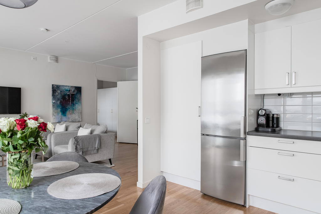 Möjlig möblering i vardagsrumsdelen/allrummet (bild från annan såld lägenhet)