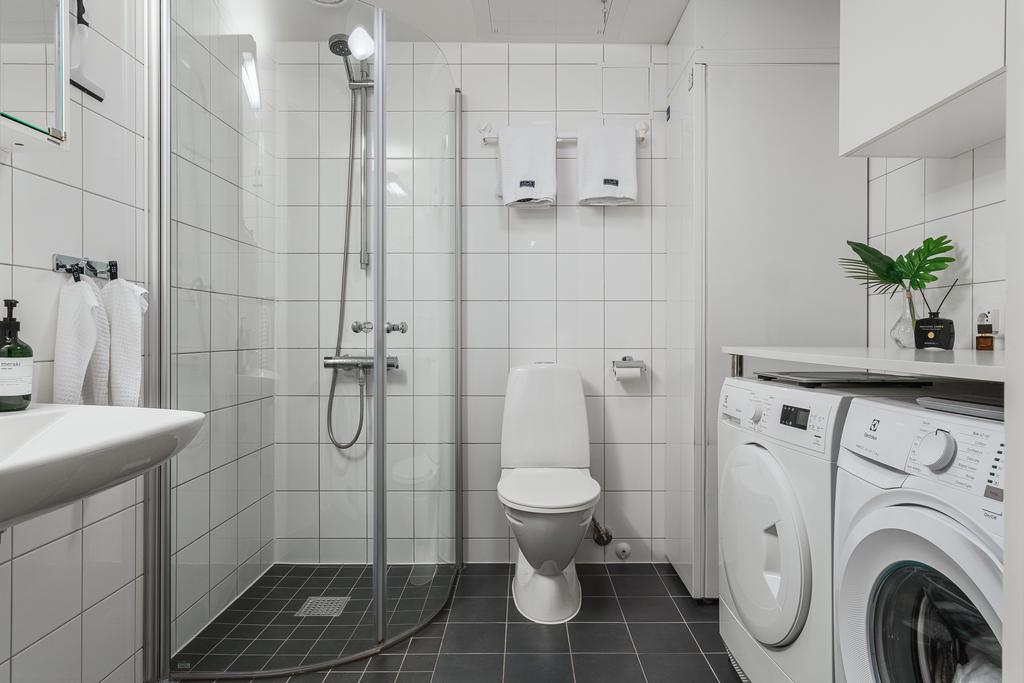 Duschrum med tvättavdelning