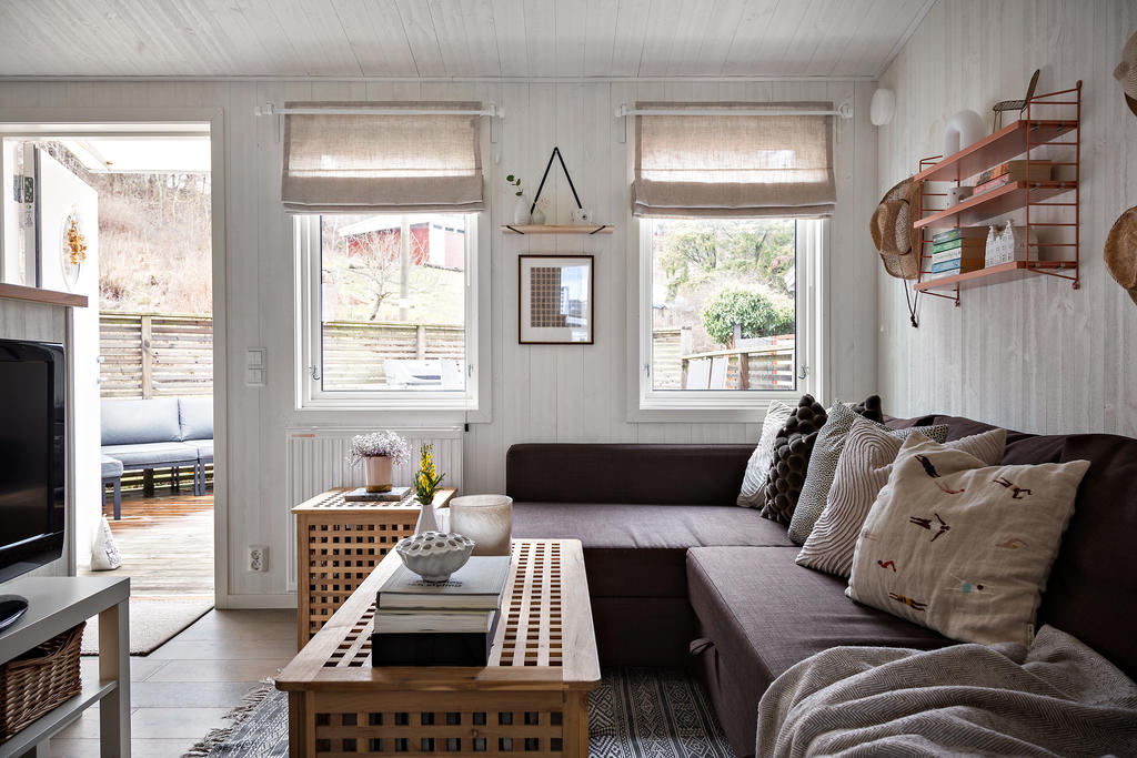 Vardagsrum med bäddsoffa för gäster att övernatta