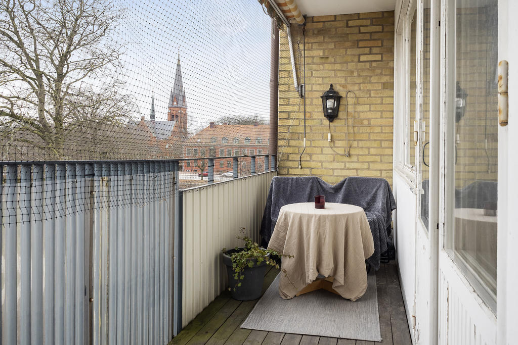 Dubbelbalkong mot parken