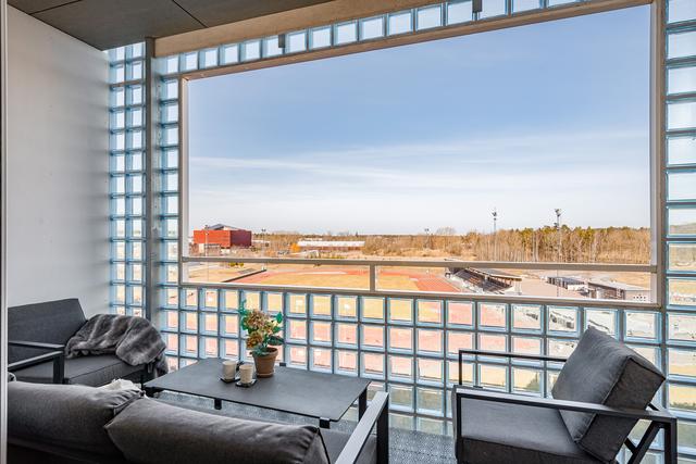 Balkong med vyer över Friidrottsarenan samt Paradisparken  