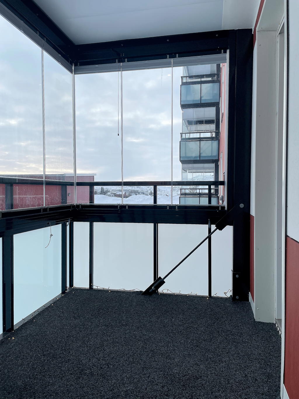 Inglasade balkongen
