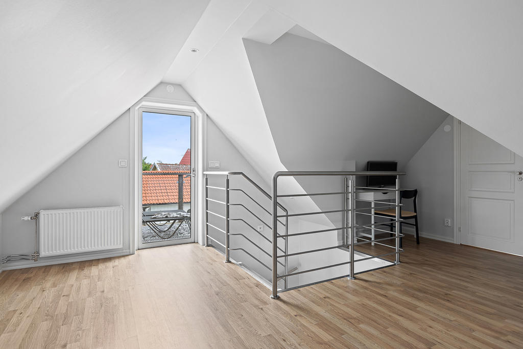 Glasdörr som leder ut till balkongen