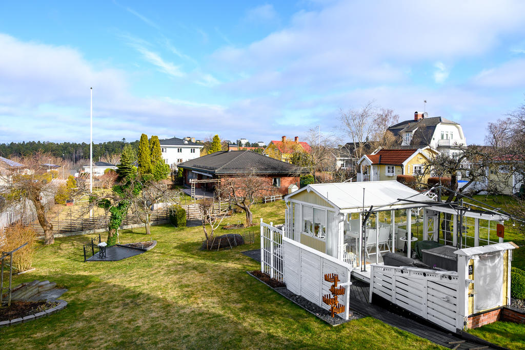 Inglasat uterum med utekök och bar