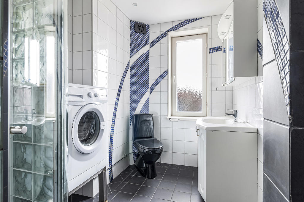 Badrum kombinerat med tvättmaskin