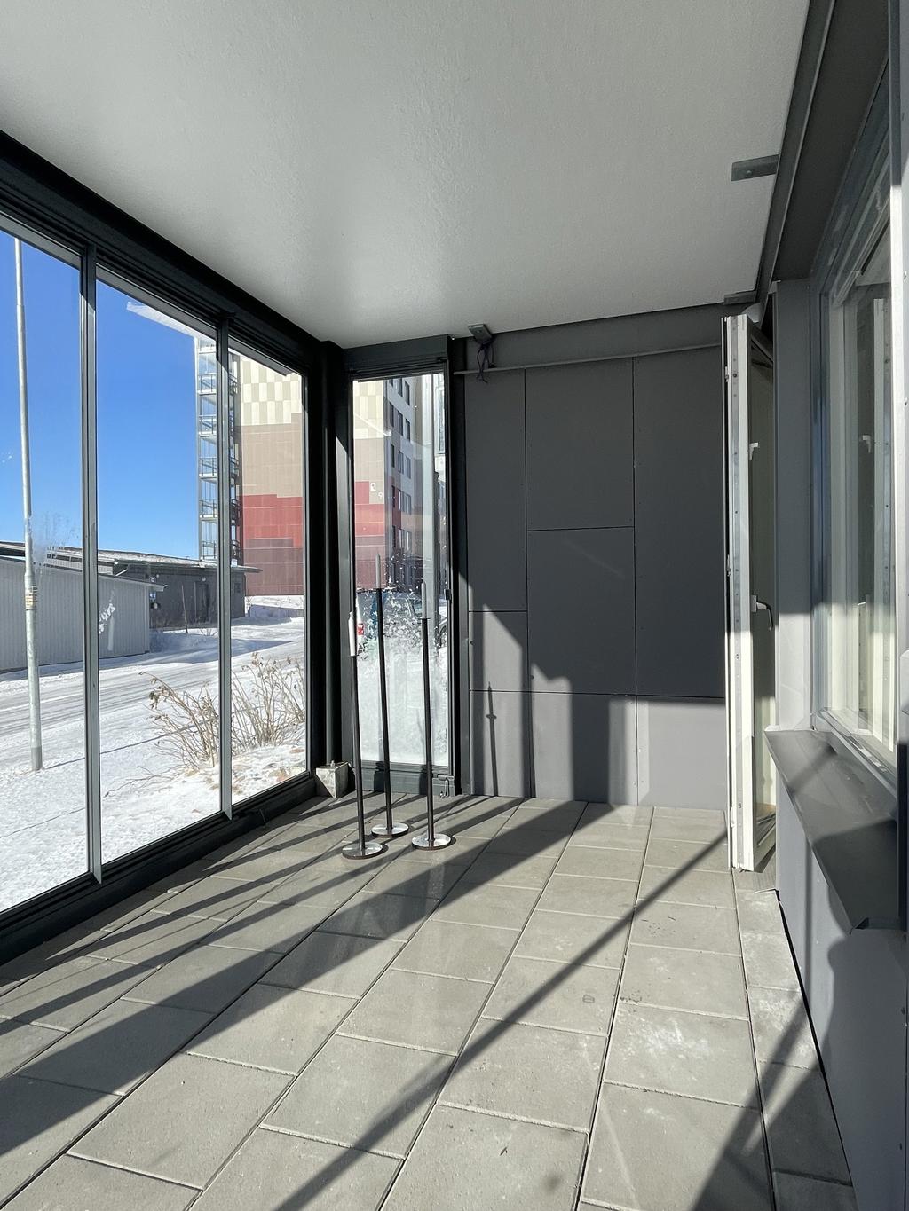 Inglasad, rymlig uteplats