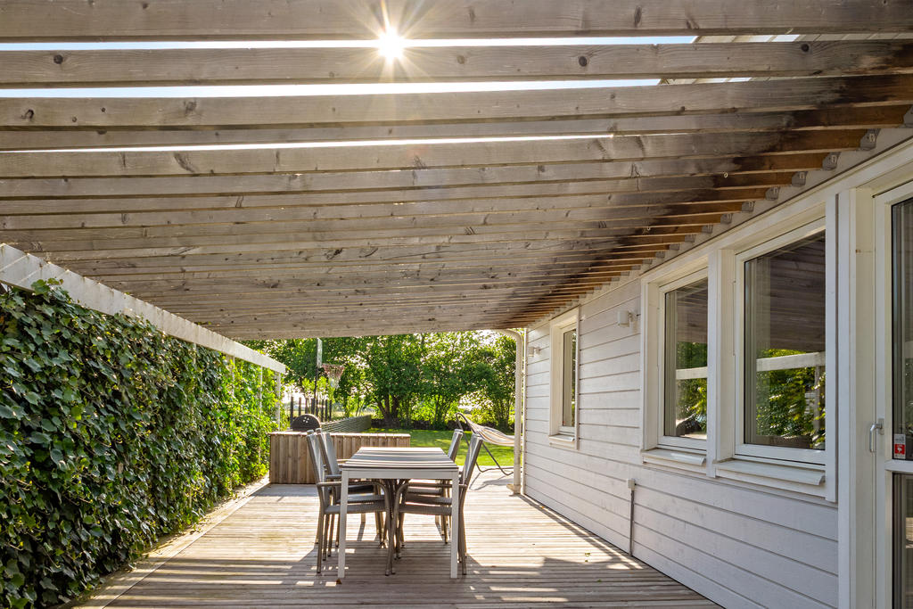 Pergola med utgång från kök