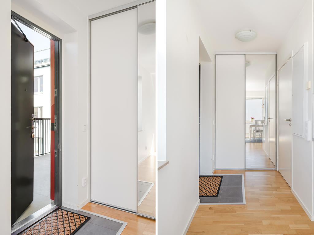 Entréhall med skjutdörrsgarderob