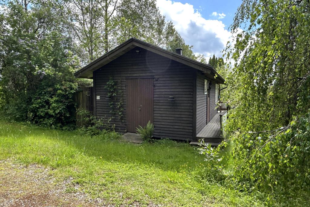 Förråd i änden på gästhus