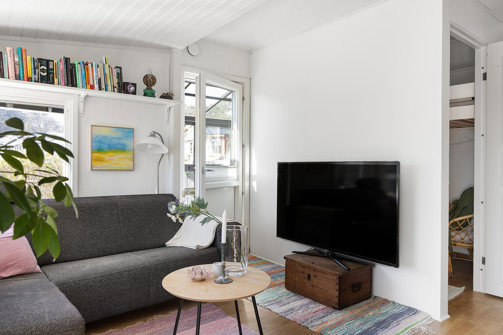 Vardagsrum med utgång till inglasingen