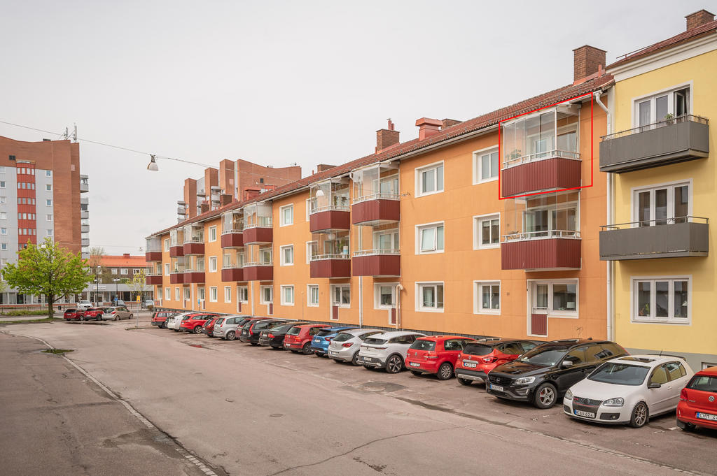 Inglasad balkong högst upp