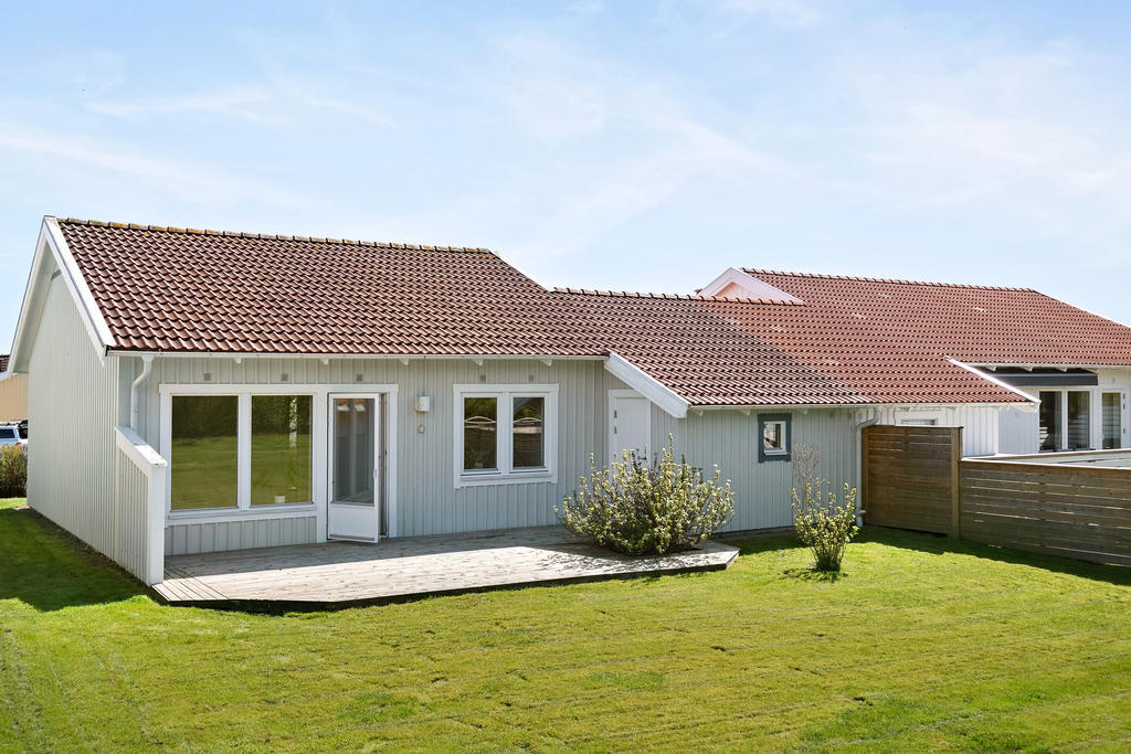 Parhus i 1 plan med fin tomt 