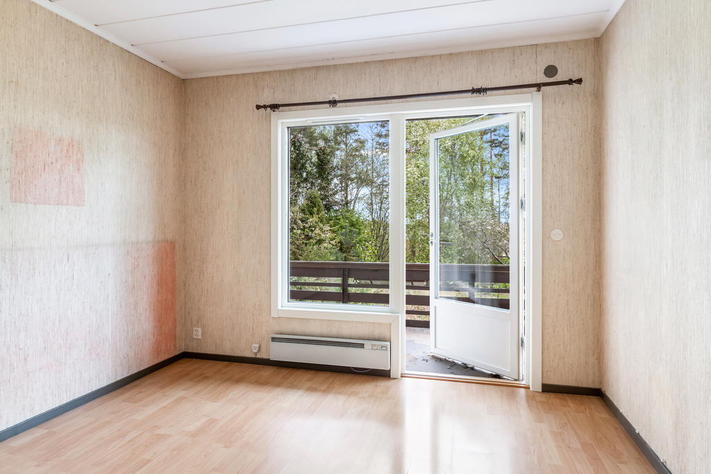 Sovrum med utgång till balkong