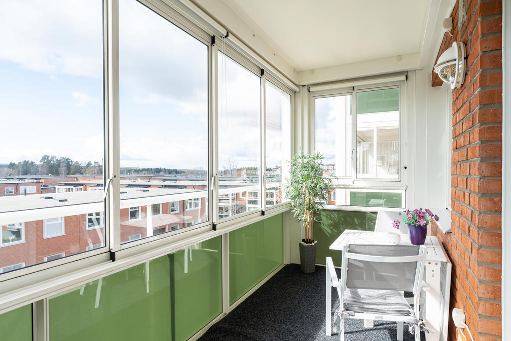 Stor inglasad balkong