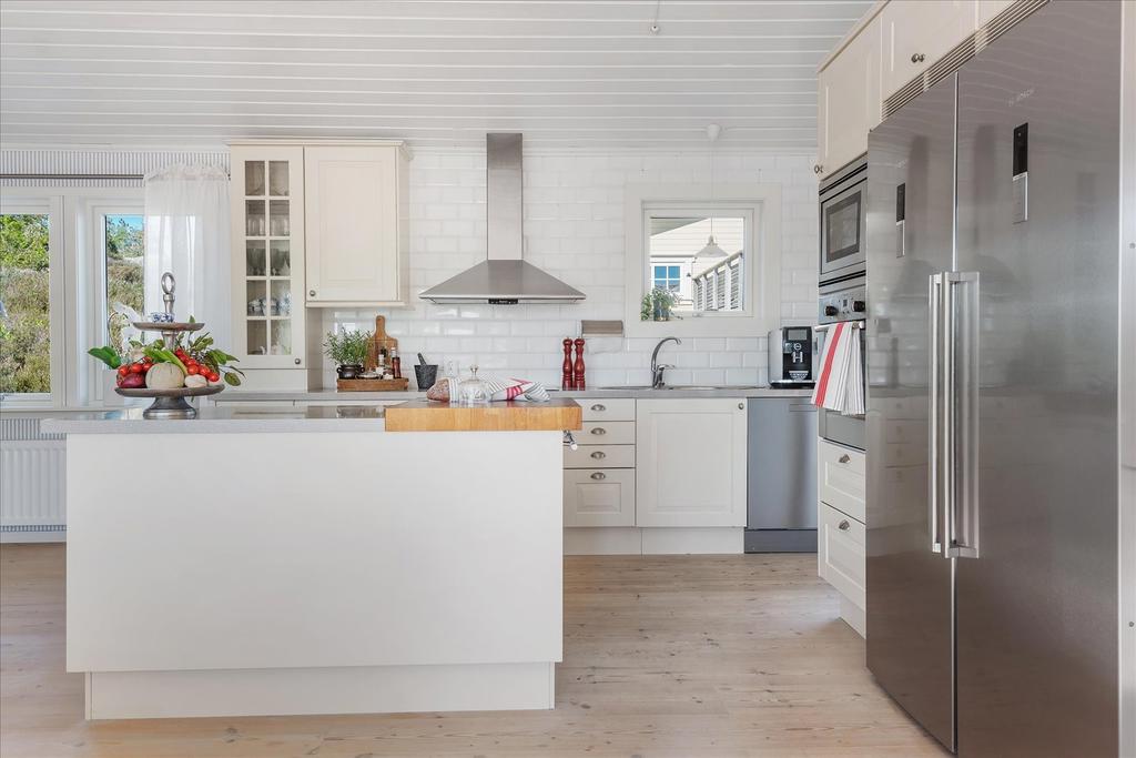 Gedigen köksö att samlas kring vid matlagning 