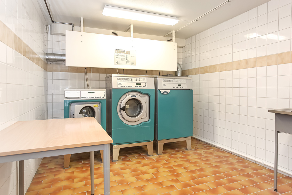 Gemensam tvättstuga i källaren