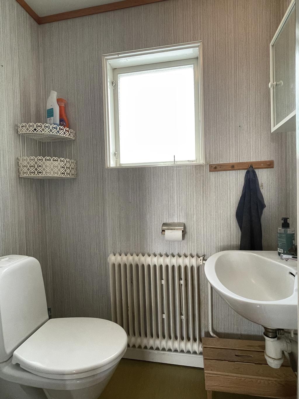 Toalett på övre plan