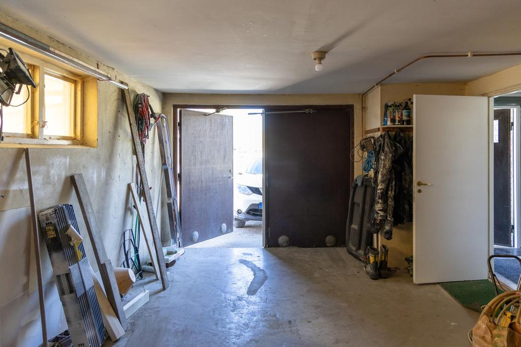 Garage vidbyggt med bostadshus