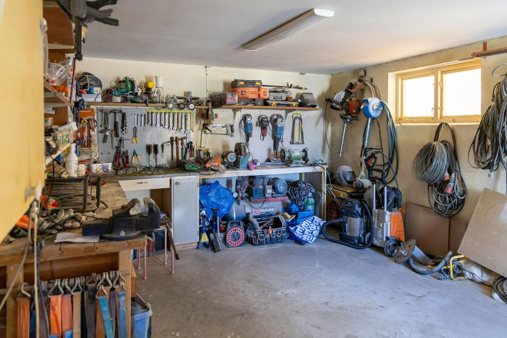 Garage vidbyggt med bostadshus