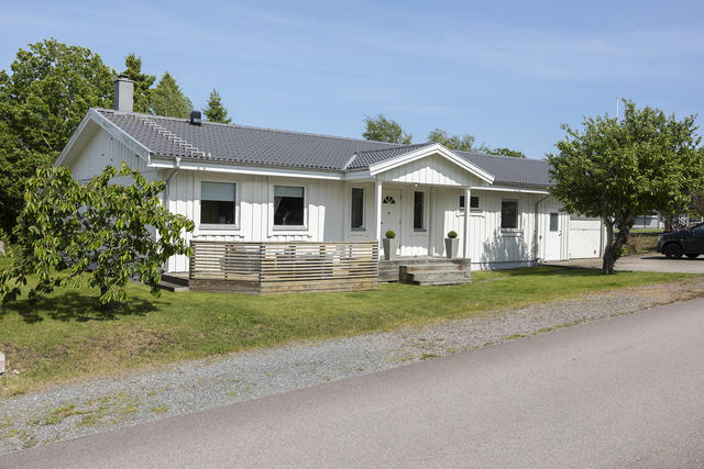 1 plans hus med vidbyggt garage