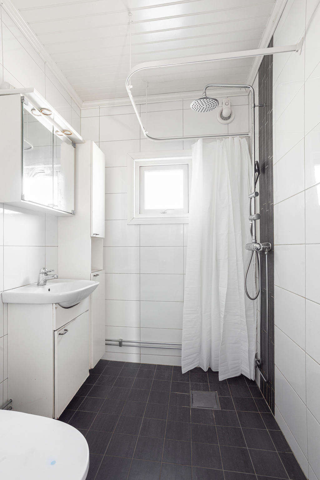 Duschrum/wc med kakel, klinkers och golvvärme