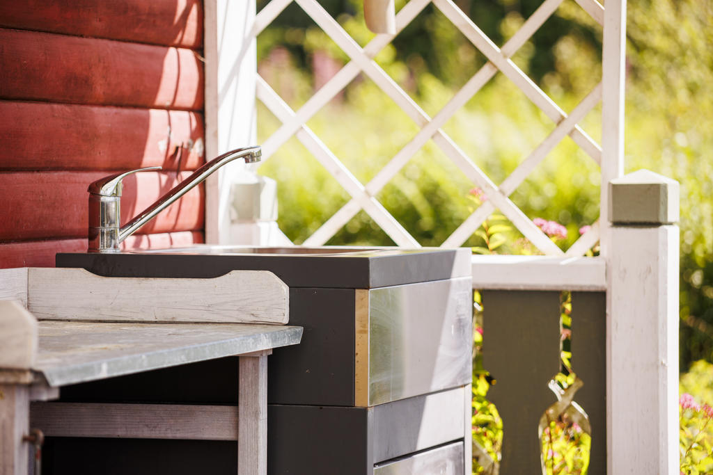Sommarvatten på verandan