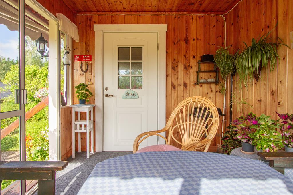 Inglasad veranda under tak