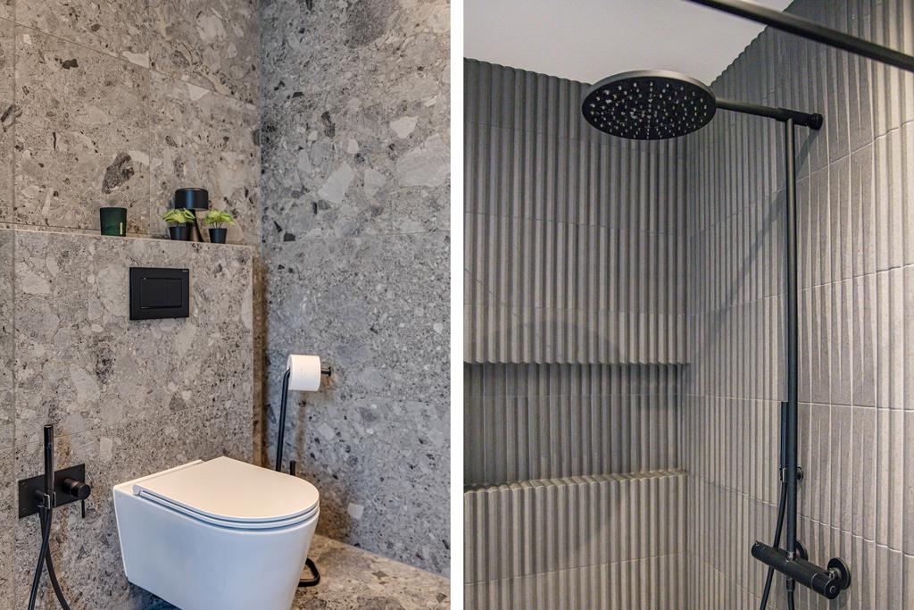 Badrummet har neutrala färger och en genomtänkt inredning med kvalitativa detaljer som stilrena blandare och kaklade ytor i harmoniska toner.