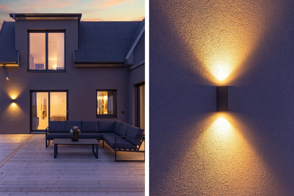 Loungehörna med detaljbild de symmetriska belysningar.