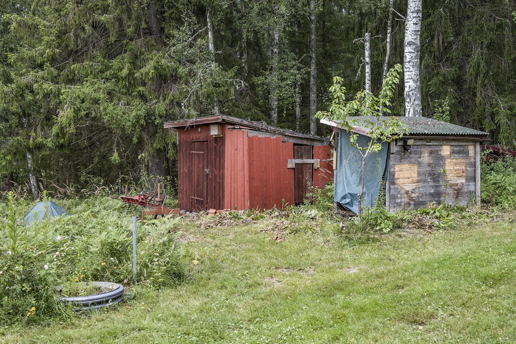Vedbod samt förvaring