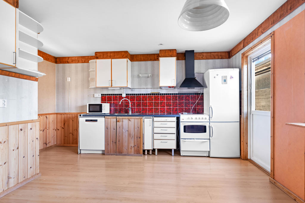 Kök som byggts om av fastighetsägaren några gånger under tidens gång. 